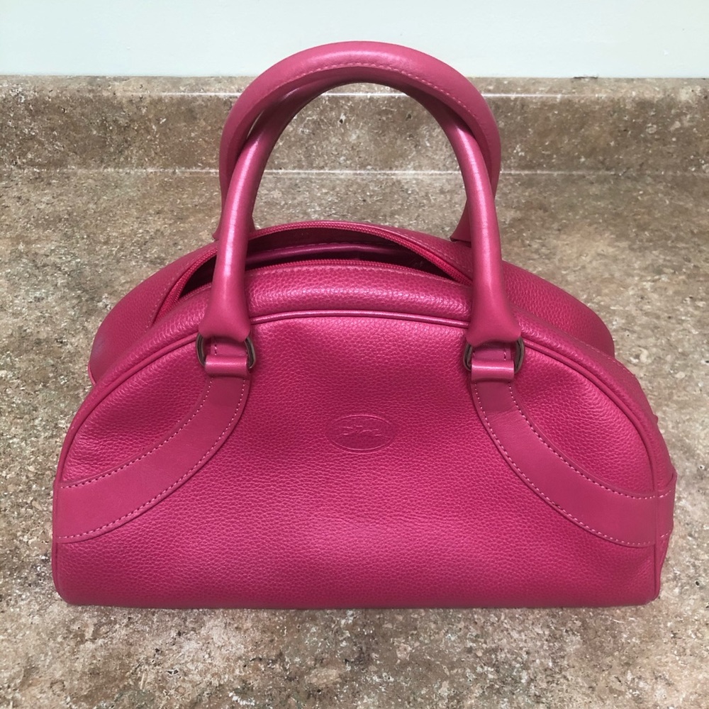Fuchsia pebbled Longchamp handle bag